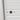 Close-up of a white roller shutter door with a black lock and two gold bolts.
