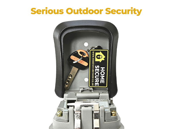 Serious outdoor security: the key safe open with spare keys stored inside.