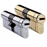 Two cylindrical door locks, one silver and one gold, with the Avocet ABS branding on them.