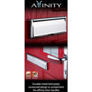 Advertisement for Affinity brand letterplates featuring a sleek, chrome-finished metal letterplate installed on a red door. The design is contoured to match Affinity door handles, shown below the letterplate.