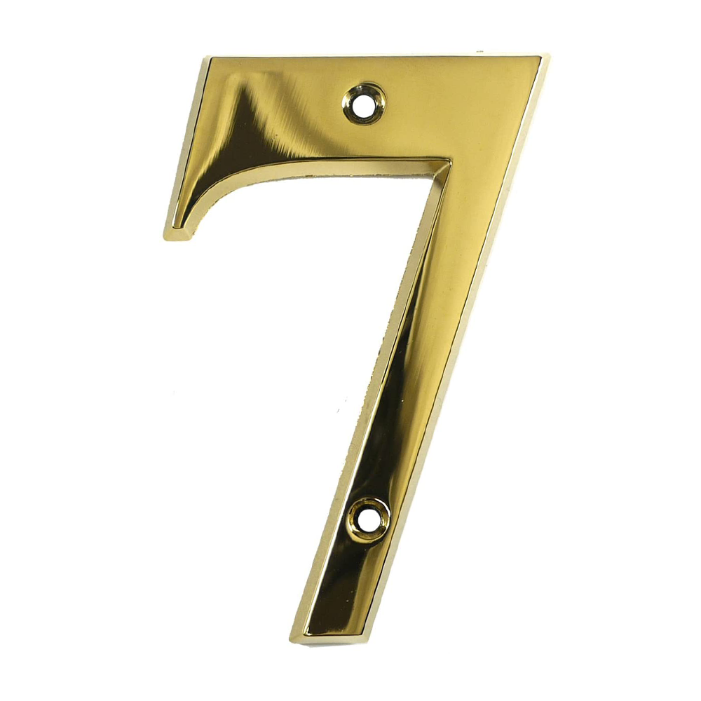 Gold-colored door number 7 against a plain background.