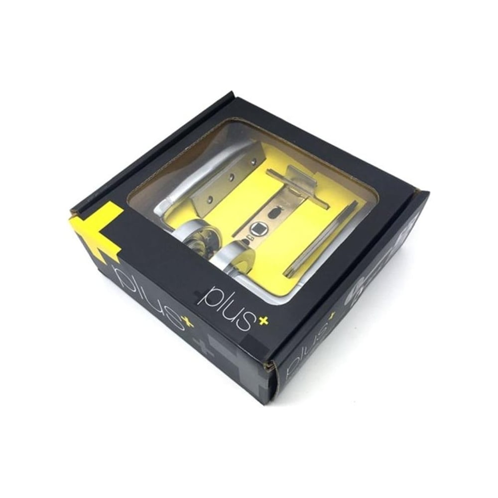 Internal door handle pack with handles, hinges, and latch on yellow background inside black packaging labeled "plus".