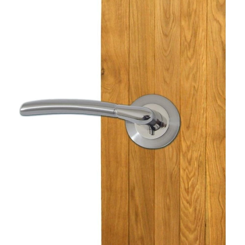 Sleek silver internal door handle installed on a wooden door.