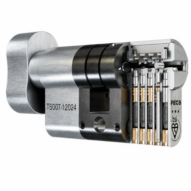 A cutaway view of a metallic cylindrical lock cylinder, showing the internal pins and mechanism. The brand name 'PECS' is visible on the side.