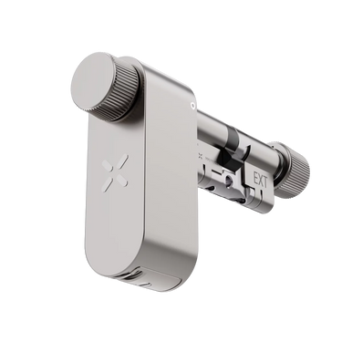 Metallic shower control valve on a white background