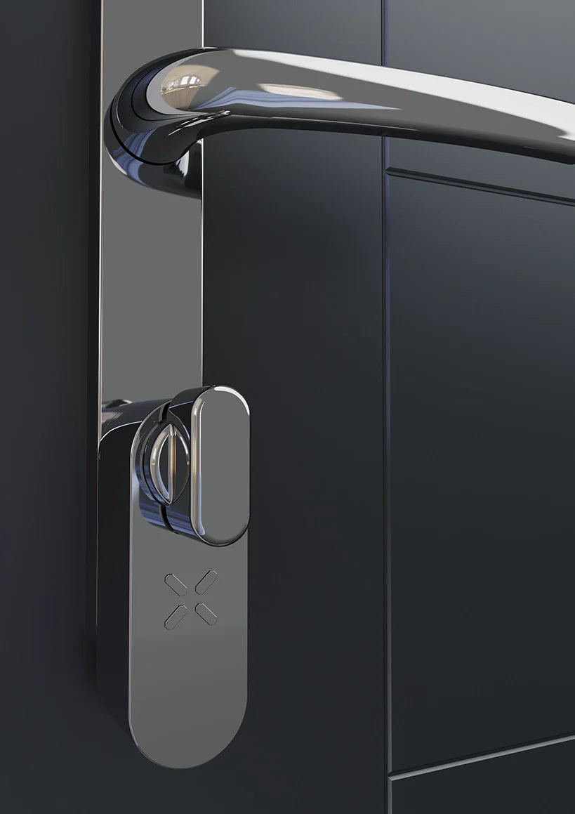 Close-up of a modern door handle on a dark surface