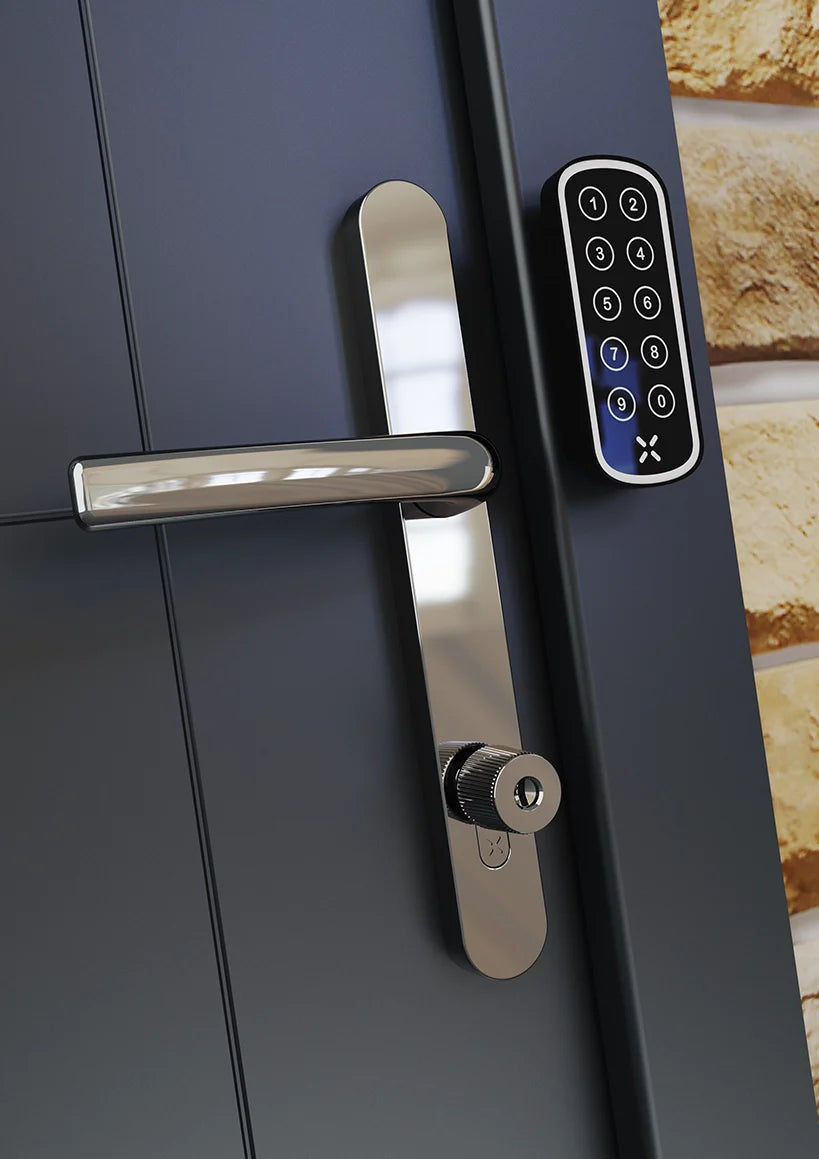 Close-up of a modern door handle with electronic keypad on a dark surface.