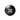 Black circular device with a white symbol on a white background