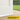 Weather bar on a door with grass and rain in the background, featuring the Home Secure brand.