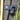Yale 51mm padlock and hasp installed on a wooden gate for outdoor security and access control.