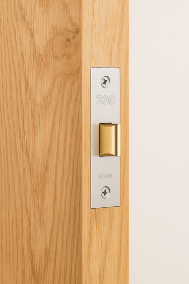 Wooden door with a gold and silver lock mechanism on a white background