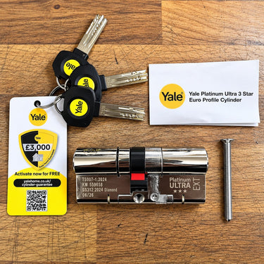 Yale Platinum Ultra euro cylinder with its 3 dimple keys, long fixing screw, Yale guarantee card and Yale info card