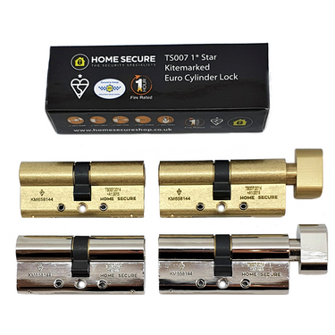Four Euro cylinder locks displayed in front of a black box labeled 'HOME SECURE TS007 1* Star Kitemarked Euro Cylinder Lock.' Two locks are brass-colored with thumb turn knobs, and two are chrome-colored with thumb turn knobs