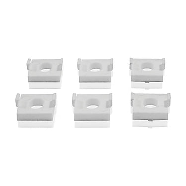 A set of six white UPVC window hinge packers spacers.